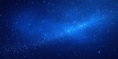 The primary subject of the image is a beautiful blue sky filled with stars. The setting is a dark, star-filled sky, which creates a sense of depth and mystery. The visual style is a combination of a photo and digital art, as the image captures the beauty of the night sky with a touch of creativity. The colors and mood of the image are predominantly blue and serene, evoking a sense of wonder and awe.