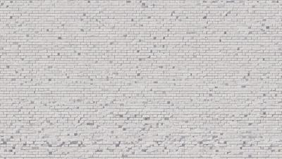 The primary subject of the image is a large brick wall. The setting is a white brick wall, which is the primary background of the image. The visual style is a photo, showcasing the brick wall in detail. The colors and mood of the image are predominantly white, giving it a clean and minimalist appearance.