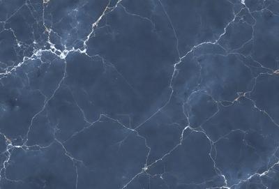 The primary subject of the image is a blue marble wall with a pattern of white and black veins. The setting is a room with a blue marble floor. The visual style is a close-up of the marble wall, showcasing the intricate patterns and textures. The colors and mood of the image are predominantly blue, with the white and black veins adding contrast and depth to the marble surface.