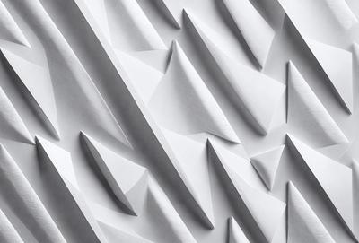 The primary subject of the image is a white wall with a pattern of triangular shapes. The setting is a room with a white background, and the visual style appears to be a combination of a photo and digital art. The dominant colors are white and gray, creating a clean and minimalist atmosphere.