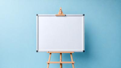 The primary subject of the image is a whiteboard with a wooden frame. The setting is a blue wall, which serves as the backdrop for the whiteboard. The visual style is a photo, capturing the whiteboard and its wooden frame in detail. The colors and mood of the image are predominantly blue, creating a calm and serene atmosphere.