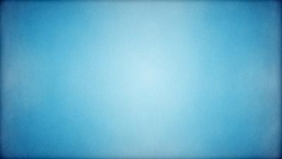 The primary subject of the image is a large, empty blue sky. The setting is a vast, open space with no visible landmarks or objects. The visual style is a simple, clean blue background, which gives the image a calm and serene atmosphere.