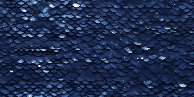The primary subject of the image is a blue and black patterned surface, which appears to be a starry night sky. The setting is a dark, star-filled sky, and the visual style is a combination of a photo and digital art. The colors and mood of the image are predominantly dark and moody, with the blue and black colors creating a sense of depth and mystery.