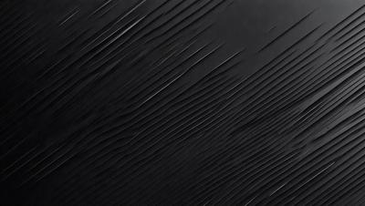 The primary subject of the image is a black background with a pattern of white lines. The setting appears to be a dark room, and the visual style is a close-up of the pattern. The dominant colors are black and white, creating a mood of simplicity and contrast.