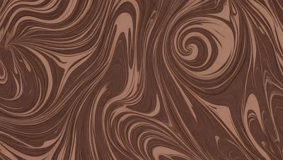 The primary subject of the image is a wooden surface with a swirling pattern. The setting is a wooden table, and the visual style is a close-up of the wooden surface. The colors and mood of the image are predominantly brown, giving it a warm and natural appearance.