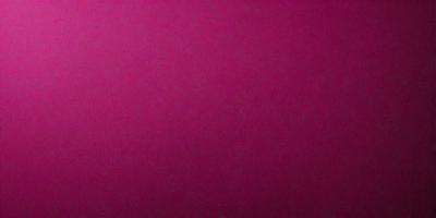 The primary subject of the image is a large, pink wall. The setting is a room with a pink background, and the visual style is a close-up of the wall. The dominant colors in the image are pink, and the overall atmosphere is warm and inviting.