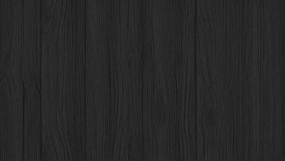The primary subject of the image is a wooden wall. The setting is a dark room, and the visual style is a close-up of the wooden wall. The colors and mood of the image are predominantly dark, with the wooden wall being the main focus.