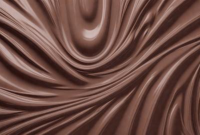 The primary subject of the image is a close-up of a chocolate-covered cake. The cake is decorated with a swirled pattern, giving it a visually appealing and appetizing appearance. The setting is a kitchen, with the cake placed on a table. The visual style of the image is a close-up, which emphasizes the details of the cake's decoration. The colors and mood of the image are predominantly brown, which is consistent with the choc