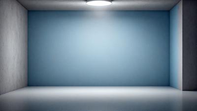 The primary subject of the image is a blue wall with a light shining on it. The setting is a room with a blue wall, and the visual style is a photo. The dominant colors are blue and white, creating a calm and serene atmosphere.
