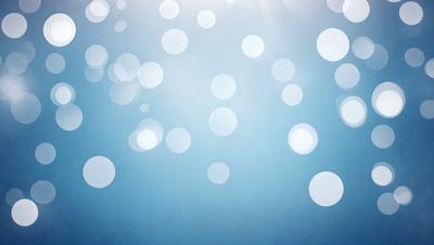The primary subject of the image is a blue background with a pattern of white bubbles. The setting is a clear blue sky, and the visual style is a digital art or illustration. The dominant colors are blue and white, creating a calm and serene atmosphere.