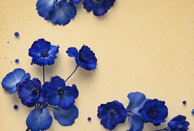 The primary subject of the image is a bouquet of blue flowers. The flowers are arranged in a visually appealing manner, with some of them placed on a yellow background. The setting appears to be a studio or a controlled environment, as the flowers are carefully positioned and the background is consistent. The visual style of the image is a combination of photo and digital art, creating a vibrant and lively atmosphere. The dominant colors in the image are blue and yellow, with the blue flowers being the main focus.