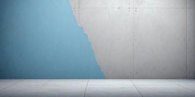 The primary subject of the image is a blue wall with a large crack in it. The setting is a room with a concrete floor. The visual style is a photo, and the colors and mood are predominantly blue, giving the scene a calm and serene atmosphere.