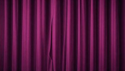 The primary subject of the image is a purple curtain. The setting is a stage or a theater, as the curtain is drawn back, revealing the purple backdrop. The visual style is a close-up of the curtain, showcasing its texture and color. The dominant colors are purple and pink, creating a warm and inviting atmosphere.