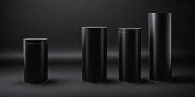 The primary subject of the image is a trio of black cylindrical objects, which are placed on a black background. The setting appears to be a dark room, and the visual style is a close-up of the three objects. The colors and mood of the image are predominantly dark and moody, with the black objects contrasting against the black background.