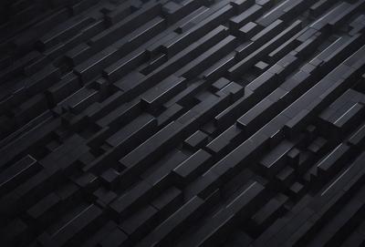 The primary subject of the image is a black and white patterned surface, which appears to be a black tile or a black and white checkered floor. The setting is a dark room, and the visual style is a close-up of the patterned surface. The colors and mood of the image are predominantly dark and moody, with the black and white pattern creating a sense of depth and contrast.