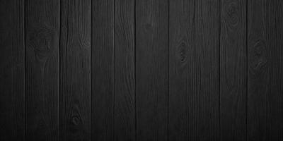 The primary subject of the image is a wooden wall. The setting is a black background, which creates a striking contrast with the wooden surface. The visual style is a close-up of the wooden wall, showcasing its texture and details. The colors and mood of the image are predominantly black, giving it a bold and dramatic appearance.