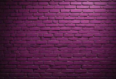 The primary subject of the image is a purple brick wall. The setting is a brick wall, and the visual style is a photo. The dominant colors are purple and pink, creating a warm and inviting atmosphere.