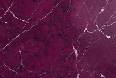 The primary subject of the image is a marbled wall with a purple hue. The setting is a room with a purple marbled wall as the main focus. The visual style is a close-up of the marbled wall, showcasing its texture and pattern. The colors and mood of the image are predominantly purple, creating a calm and sophisticated atmosphere.