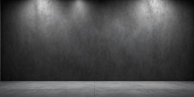 The primary subject of the image is a large, gray wall with a rough texture. The setting is a room with a concrete floor. The visual style is a photo, and the dominant colors are gray and black. The overall atmosphere is minimalistic and industrial.