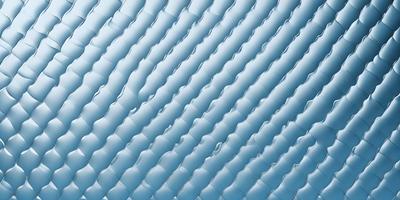 The primary subject of the image is a blue wall with a pattern of white and blue stripes. The setting is a room with a blue background, and the visual style appears to be a combination of a photo and digital art. The dominant colors are blue and white, creating a calm and soothing atmosphere.