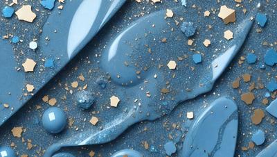 The primary subject of the image is a blue surface with gold glitter sprinkled on it. The setting appears to be a creative and artistic environment, possibly a workspace or a display. The visual style of the image is a combination of digital art and illustration, with the gold glitter creating a unique and eye-catching effect. The dominant colors in the image are blue and gold, giving it a vibrant and lively atmosphere.