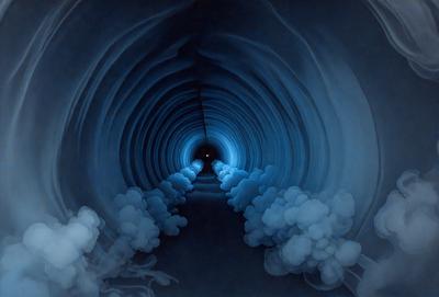 The primary subject of the image is a tunnel with a blue light illuminating it. The tunnel appears to be a long, curved passage with a blue glow, creating a unique atmosphere. The setting is a dark, enclosed space, and the visual style is a combination of a photo and digital art, giving the image a surreal and futuristic appearance. The dominant colors are blue and black, with the blue light creating a sense of depth and mystery.