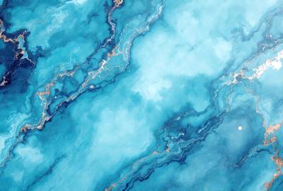 The primary subject of the image is a blue and white ocean scene. The setting is a large body of water with a blue and white color scheme. The visual style is a photo of the ocean, capturing the beauty of the water and its surroundings. The colors and mood of the image are serene and calming, with the blue and white hues creating a sense of tranquility and relaxation.