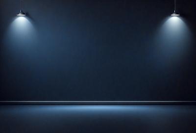 The primary subject of the image is a blue wall with a blue background. The setting is a dark room, and the visual style is a black and white photo. The dominant colors and overall atmosphere are dark and moody.