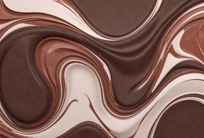 The primary subject of the image is a close-up of a chocolate bar, showcasing its texture and details. The setting is a white background, which provides a clean and minimalist look. The visual style is a close-up, which emphasizes the chocolate's texture and intricate patterns. The colors are predominantly brown, which is the color of the chocolate bar, and the overall atmosphere is rich and indulgent.