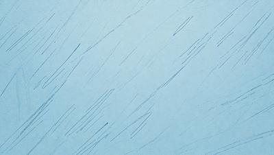 The primary subject of the image is a blue wall with a pattern of white lines. The setting is a room with a blue background. The visual style is a close-up of the blue wall with white lines. The colors and mood of the image are predominantly blue and white, creating a calm and serene atmosphere.