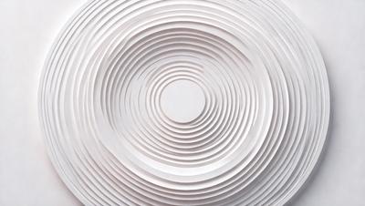 The primary subject of the image is a white circle with a hole in the center. The circle is surrounded by a series of white, curved, and circular shapes, creating a visually interesting pattern. The setting appears to be a white background, which further emphasizes the shapes and their contrast. The visual style of the image is a combination of photo and digital art, as it showcases a unique and intricate design. The colors and mood of the image are predominantly white, giving it a clean and minimalist appearance.