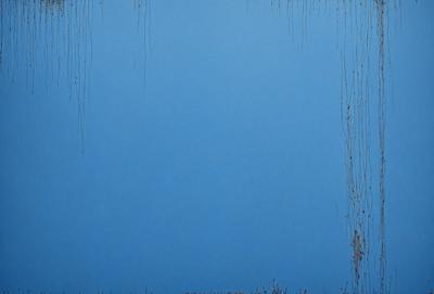 The primary subject of the image is a blue wall with a white border. The setting is a room with a blue background. The visual style is a painting, and the colors and mood are predominantly blue and calm.