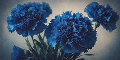 The primary subject of the image is a bouquet of three blue flowers. The flowers are arranged in a vase, which is placed on a table. The setting is indoors, with a wall visible in the background. The visual style of the image is a photo, capturing the beauty of the flowers in their natural environment. The dominant colors in the image are blue, creating a calm and serene atmosphere.