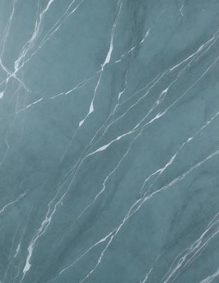 The primary subject of the image is a blue marble wall with a pattern of white lines. The setting is a room with a blue background, and the visual style is a close-up of the marble wall. The colors and mood of the image are predominantly blue and white, creating a calm and serene atmosphere.