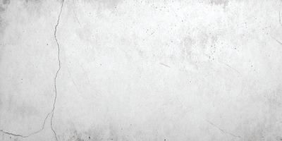 The primary subject of the image is a white wall with a gray texture. The setting is a room with a white wall, and the visual style is a photo. The dominant colors are white and gray, creating a calm and neutral atmosphere.