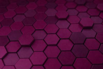 The primary subject of the image is a purple surface with a pattern of hexagons. The setting is a close-up of the purple surface, which appears to be a textured or patterned material. The visual style is a close-up of the purple surface, showcasing the hexagonal pattern. The colors and mood of the image are predominantly purple, creating a calm and soothing atmosphere.
