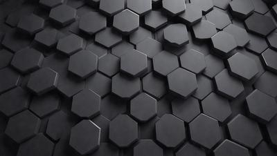 The primary subject of the image is a black and white pattern of hexagons. The setting is a black background, and the visual style appears to be a digital art or illustration. The dominant colors are black and white, creating a bold and striking pattern. The overall atmosphere of the image is modern and minimalistic.
