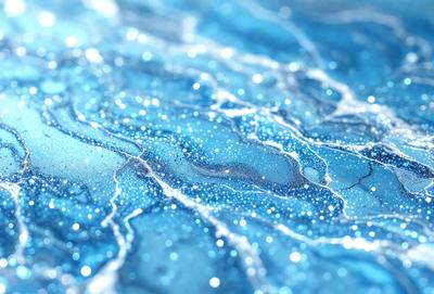The primary subject of the image is a blue and white ocean scene. The setting is a blue ocean with a few ripples, and the background features a blue and white pattern. The visual style is a digital art or illustration, creating a vibrant and colorful atmosphere. The dominant colors are blue and white, with the blue ocean and white ripples creating a serene and calming mood.