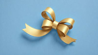 The primary subject of the image is a gold bow, which is prominently displayed on a blue background. The visual style of the image is a close-up of the bow, showcasing its details and texture. The colors in the image are predominantly gold and blue, creating a warm and inviting atmosphere.