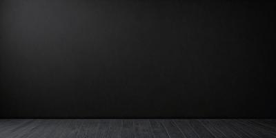 The primary subject of the image is a black wall with a wooden floor. The setting is a room with a black wall, and the visual style is a photo. The colors and mood of the image are dark and moody, with the black wall and wooden floor creating a sense of depth and contrast.