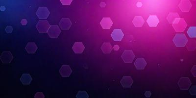 The primary subject of the image is a purple background with a pattern of hexagons. The setting is a dark, purple-colored space, which creates a moody atmosphere. The visual style of the image is a combination of digital art and illustration, as it features a unique and intricate pattern of hexagons. The colors and mood of the image are predominantly purple, giving it a calm and serene appearance.