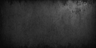 The primary subject of the image is a black and white photo of a wall. The setting is a black and white background, which gives the photo a classic and timeless appearance. The visual style is a close-up of the wall, showcasing its texture and details. The colors and mood of the image are predominantly black and white, creating a sense of depth and contrast.