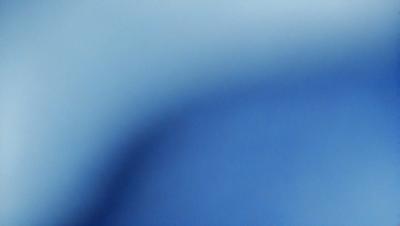 The primary subject of the image is a blue background with a blue sky. The setting is a clear, cloudless sky, and the visual style is a photo. The colors and mood of the image are predominantly blue, creating a calm and serene atmosphere.