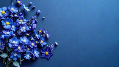 The primary subject of the image is a bouquet of blue flowers, which are scattered across a blue background. The setting appears to be a blue wall or a blue surface, which adds to the overall mood of the image. The visual style of the image is a close-up of the flowers, showcasing their beauty and details. The colors and mood of the image are predominantly blue, creating a calm and serene atmosphere.