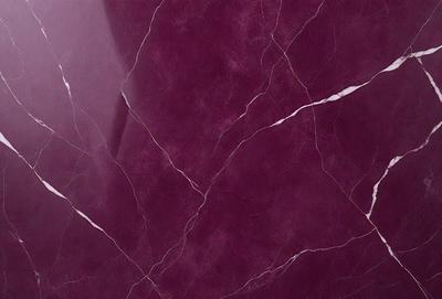 The primary subject of the image is a marbled surface, which appears to be a purple marble. The setting is a close-up of the marbled surface, showcasing its texture and pattern. The visual style is a realistic representation of the marbled surface, capturing its natural beauty. The colors and mood of the image are predominantly purple, giving it a luxurious and elegant appearance.