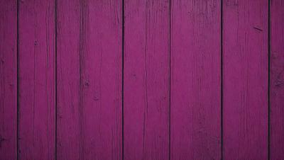 The primary subject of the image is a purple wooden wall. The setting is a room with a purple wall, and the visual style is a close-up of the wall. The colors and mood of the image are predominantly purple, creating a calm and serene atmosphere.