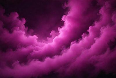 The primary subject of the image is a purple cloud, which is the main object, scene, or focus of the image. The setting or background is a dark sky, and the visual style appears to be a photo. The dominant colors in the image are purple and pink, creating a moody and atmospheric mood.