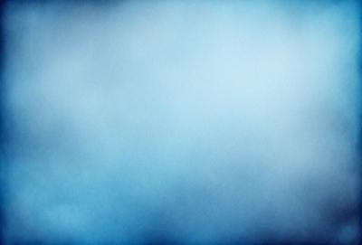 The primary subject of the image is a blue sky with clouds. The setting is a cloudy day, and the visual style is a natural, outdoor scene. The colors and mood of the image are predominantly blue, creating a calm and serene atmosphere.