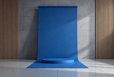 The primary subject of the image is a blue curtain, which is hanging on a wall. The setting is a room with a white tile floor. The visual style is a photo, and the dominant colors are blue and white. The overall atmosphere of the image is calm and serene.