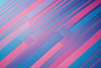 The primary subject of the image is a colorful, abstract pattern featuring a mix of pink, blue, and purple hues. The setting is a wall, and the visual style appears to be a combination of digital art and illustration. The colors and mood of the image are vibrant and lively, creating a sense of energy and creativity.